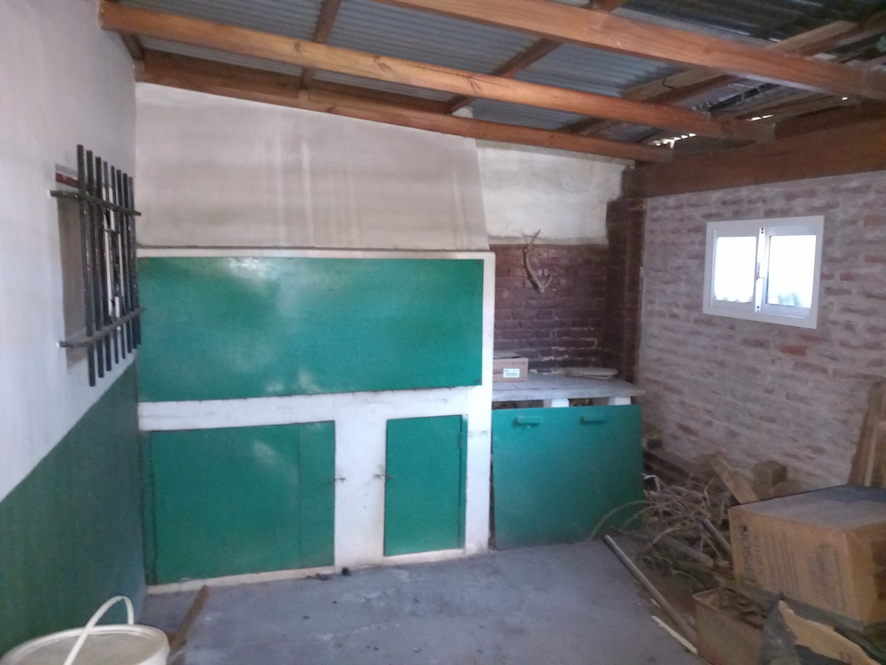 VENTA CASA  COCHERA PATIO ITUZAINGO Y CHAMPAGNAT